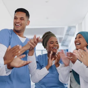 Group of happy nurses celebrating