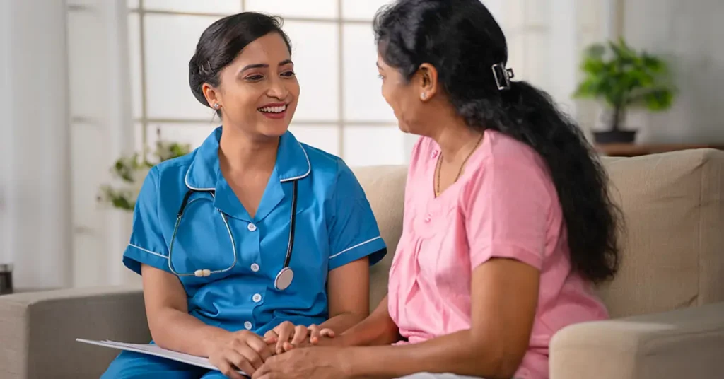 Nurse speaking to a patient