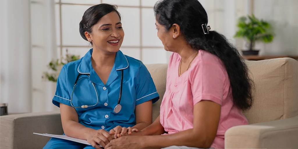 Nurse speaking to a patient