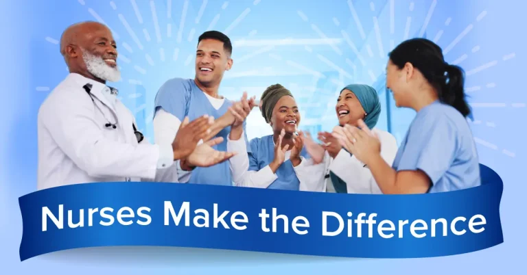 A team of happy nurses in a hospital setting celebrate together.