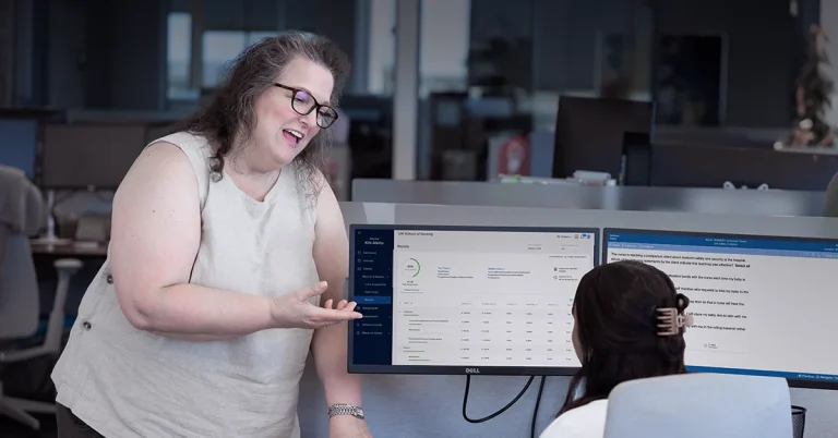 Educator reviewing UWorld’s NCLEX prep data with student